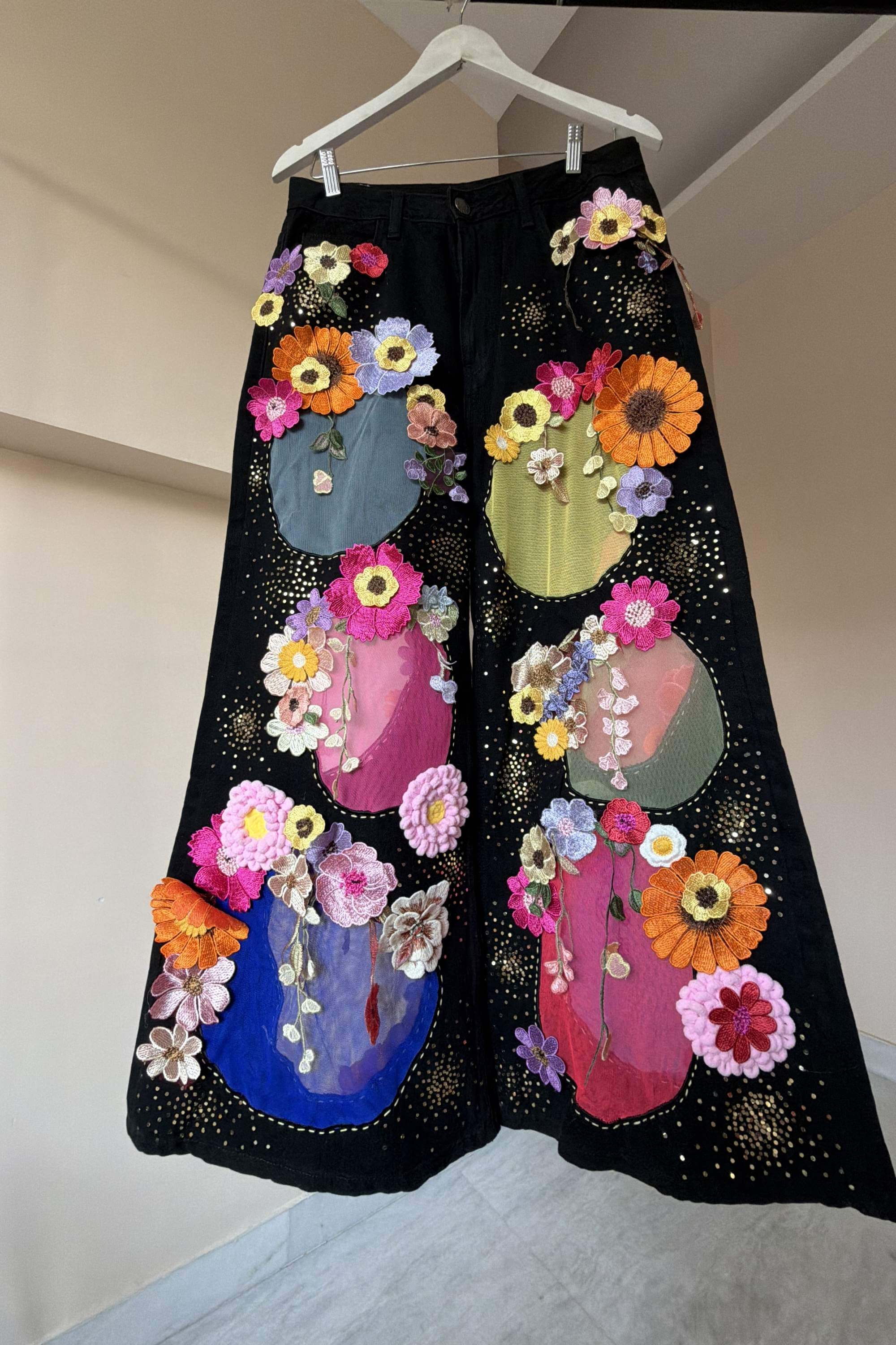 BLACK CUT OUT FLORAL PANTS