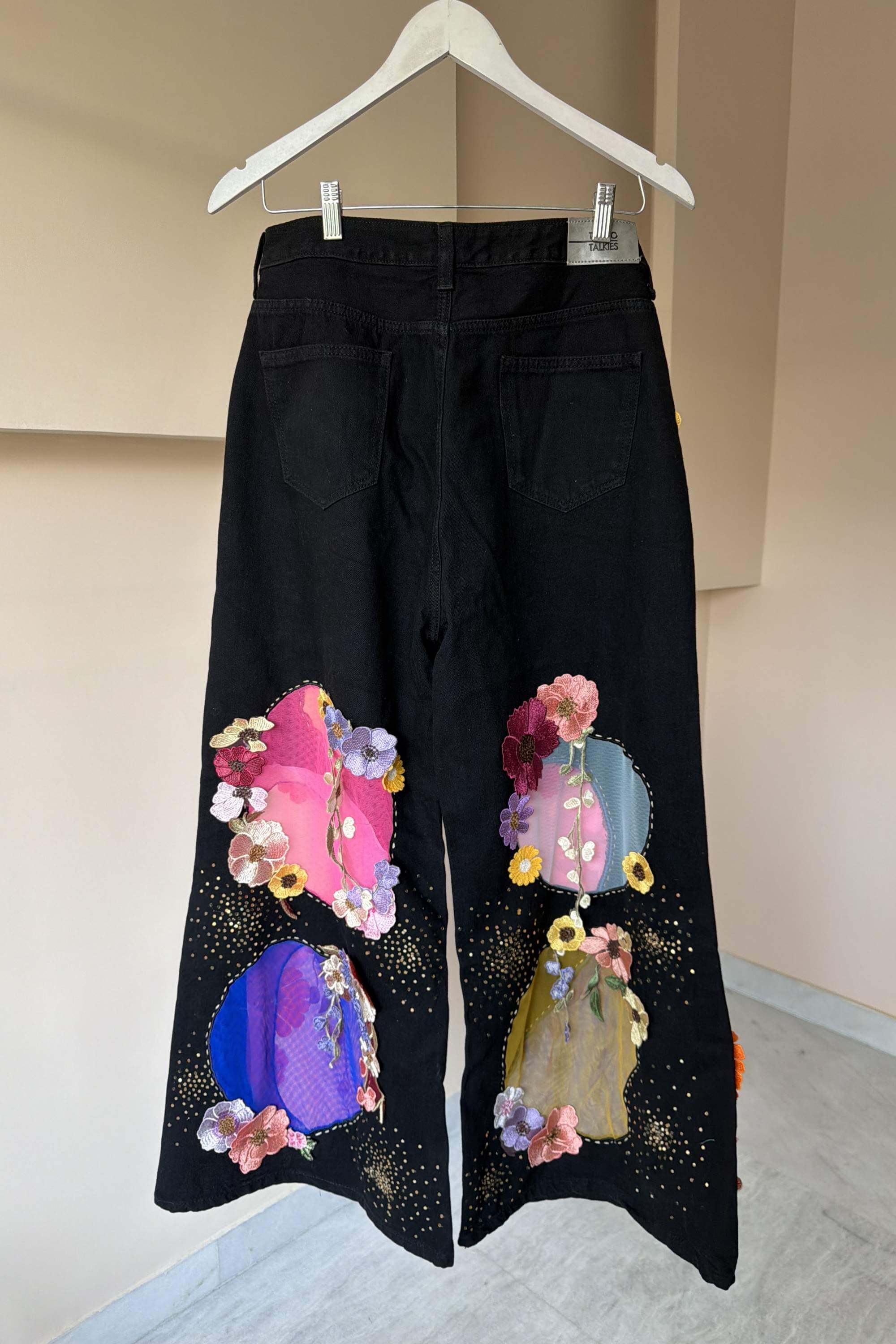 BLACK CUT OUT FLORAL PANTS
